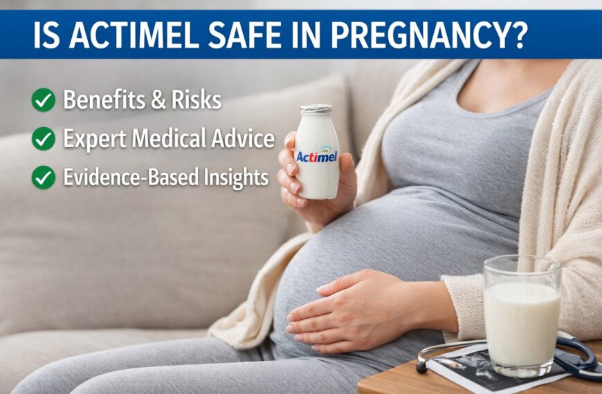 Pregnant woman holding Actimel probiotic drink showing safety of probiotics during pregnancy for immune and digestive health